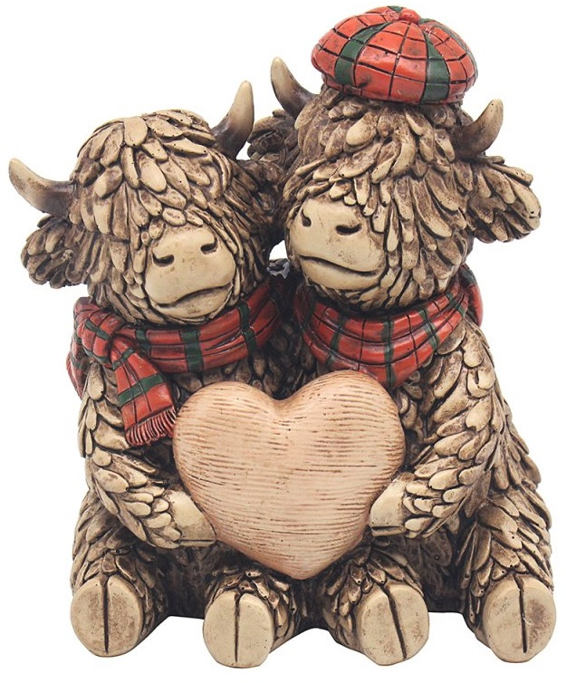 Highland Cows With A Heart Ornament