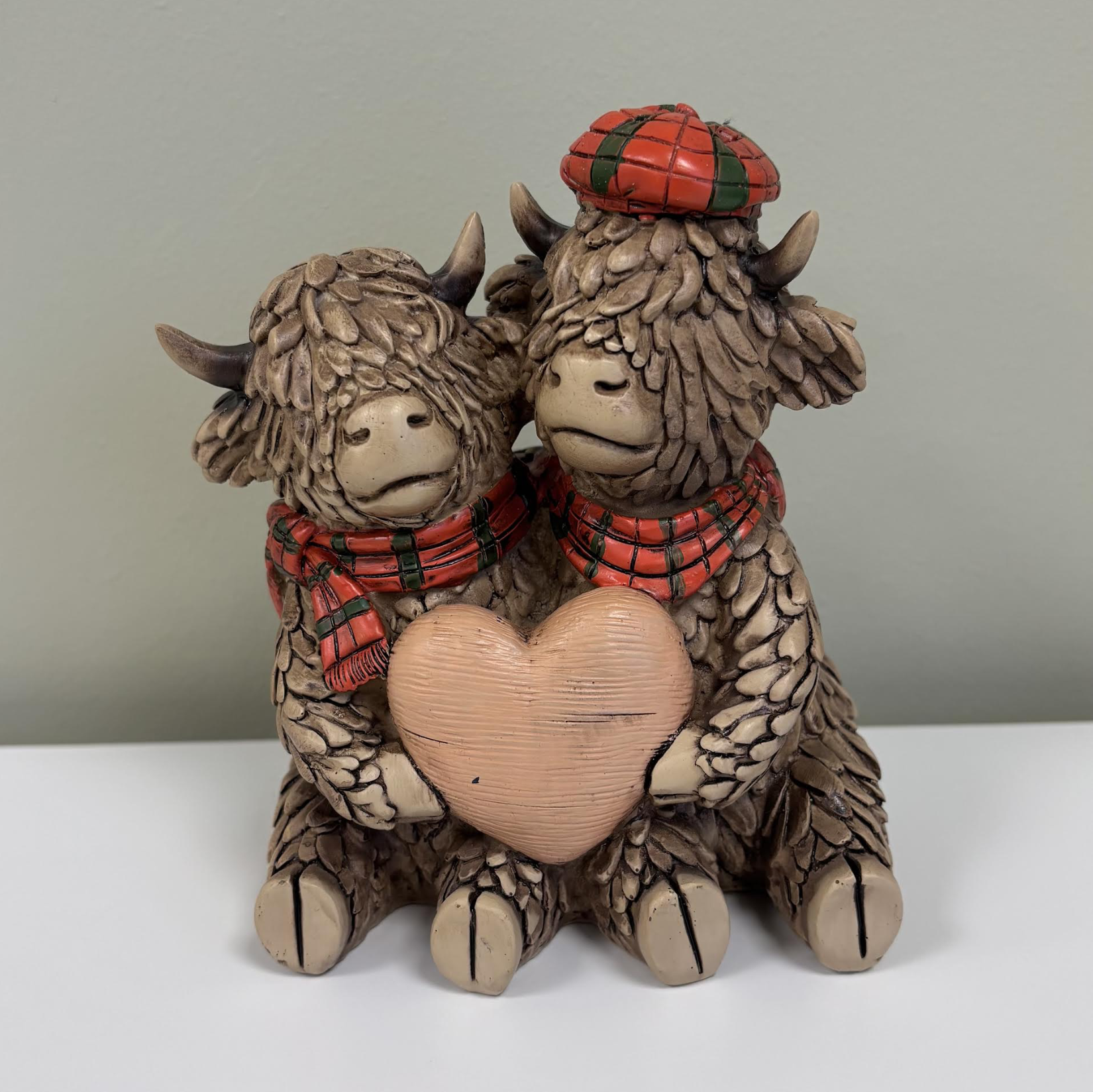 Cows With A Heart Ornament